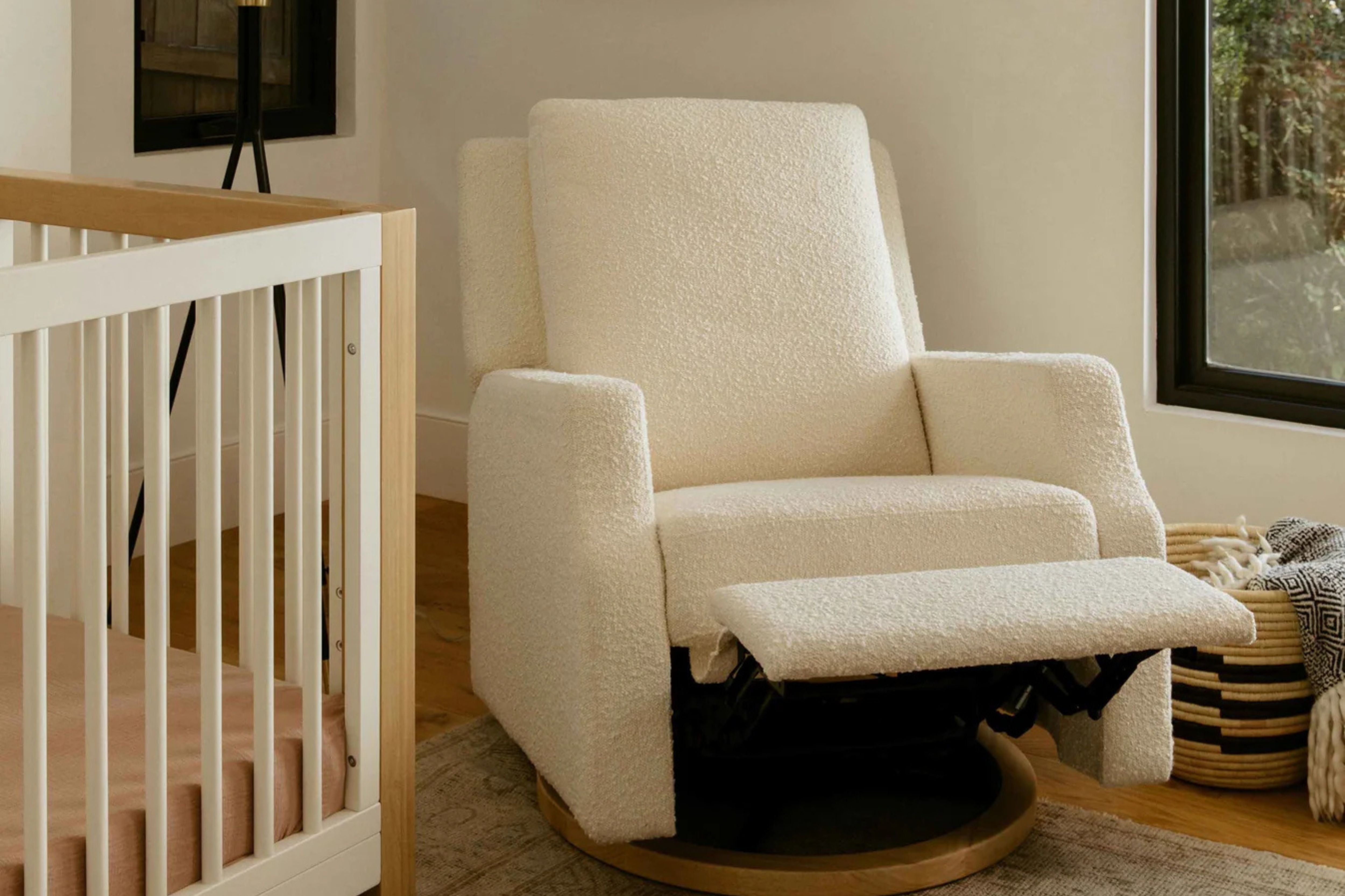 Namesake Crewe Recliner and Swivel Glider in Ivory Boucle with the recliner propped up #color_crewe-ivory-boucle
