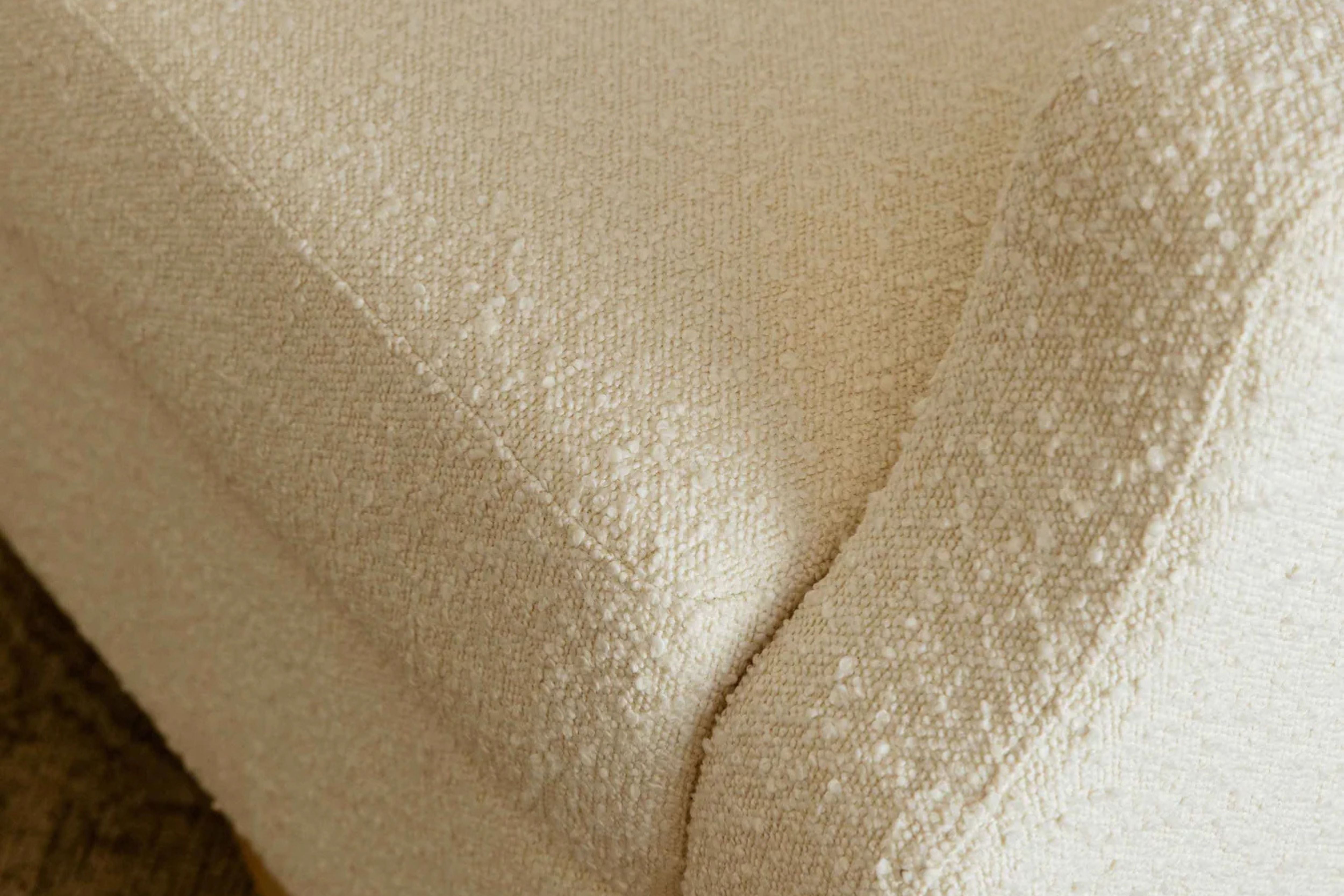 Namesake Crewe Recliner and Swivel Glider in Ivory Boucle with light wood base #color_crewe-ivory-boucle