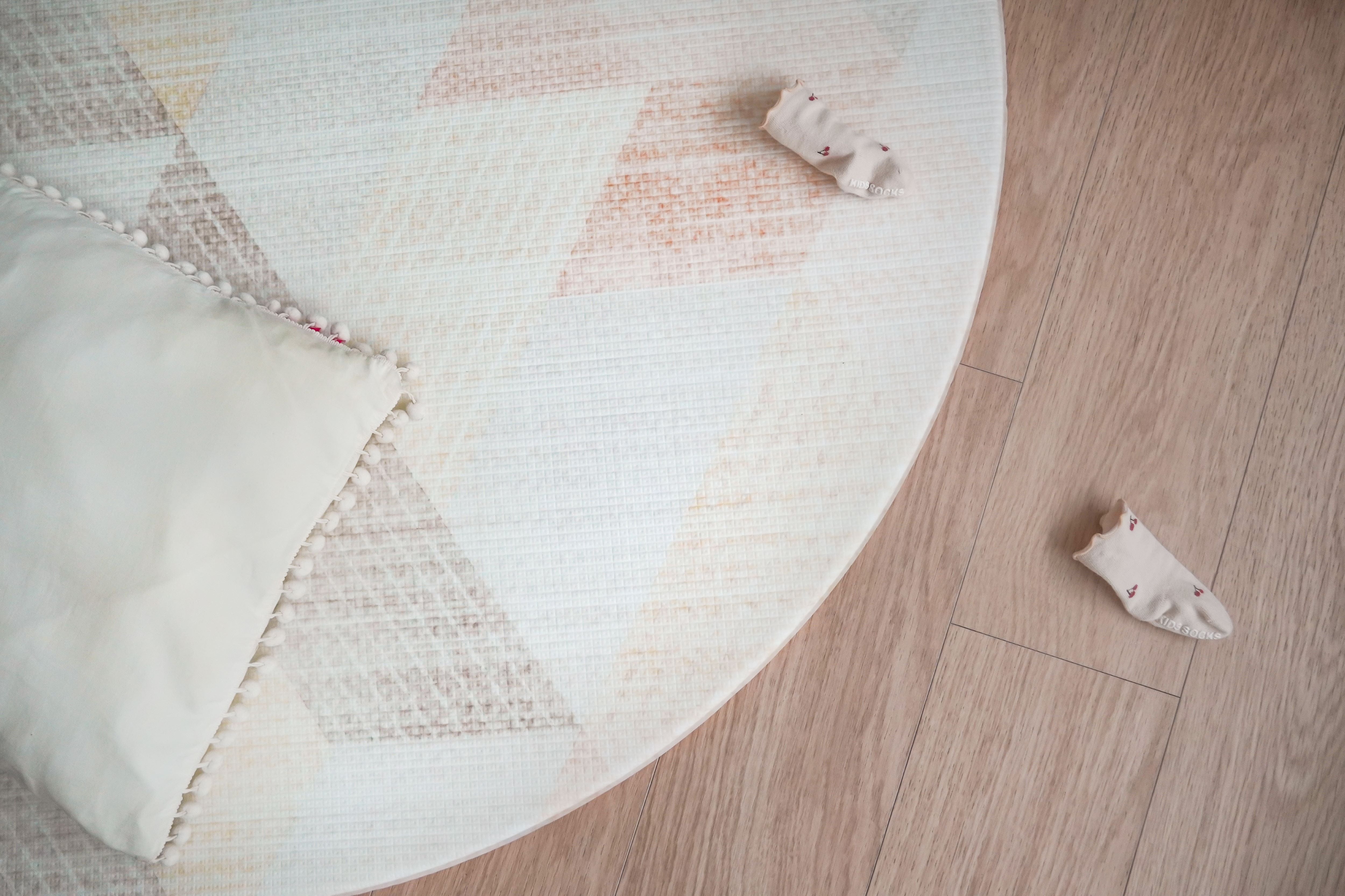 baby socks on lollibly sand dune round play mat