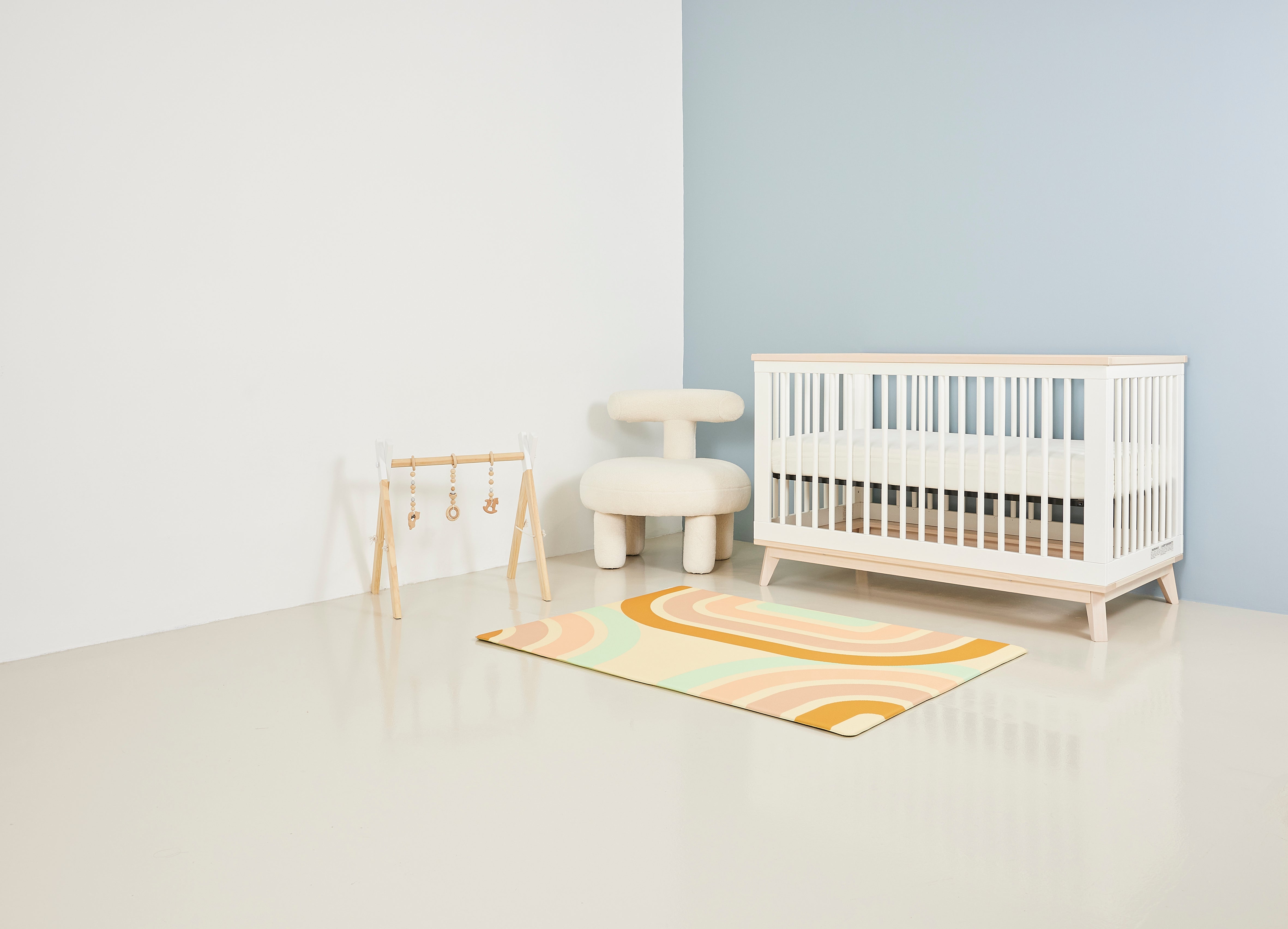 lollibly holiday little play mat styled with crib