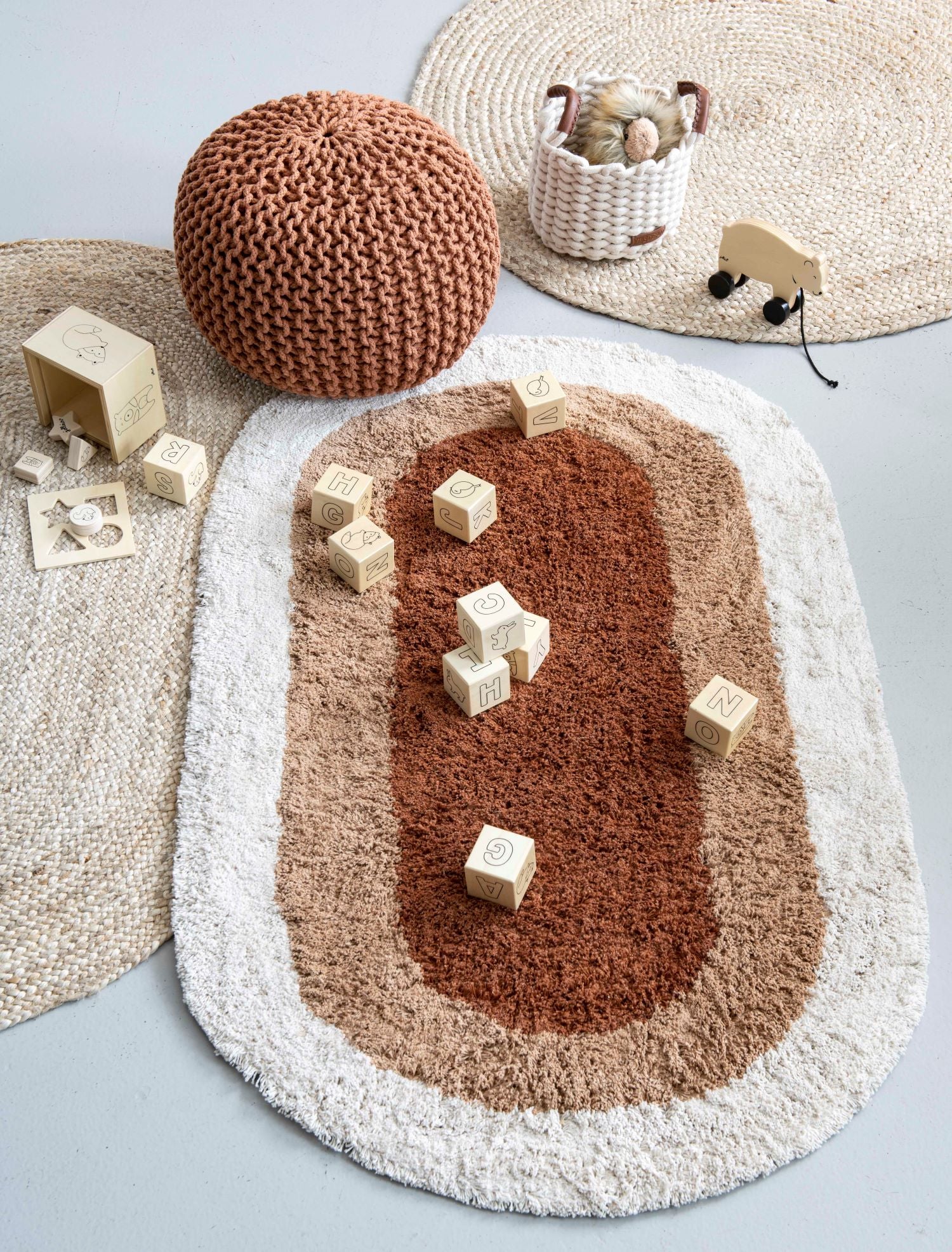 kids depot otis rug with wooden blocks