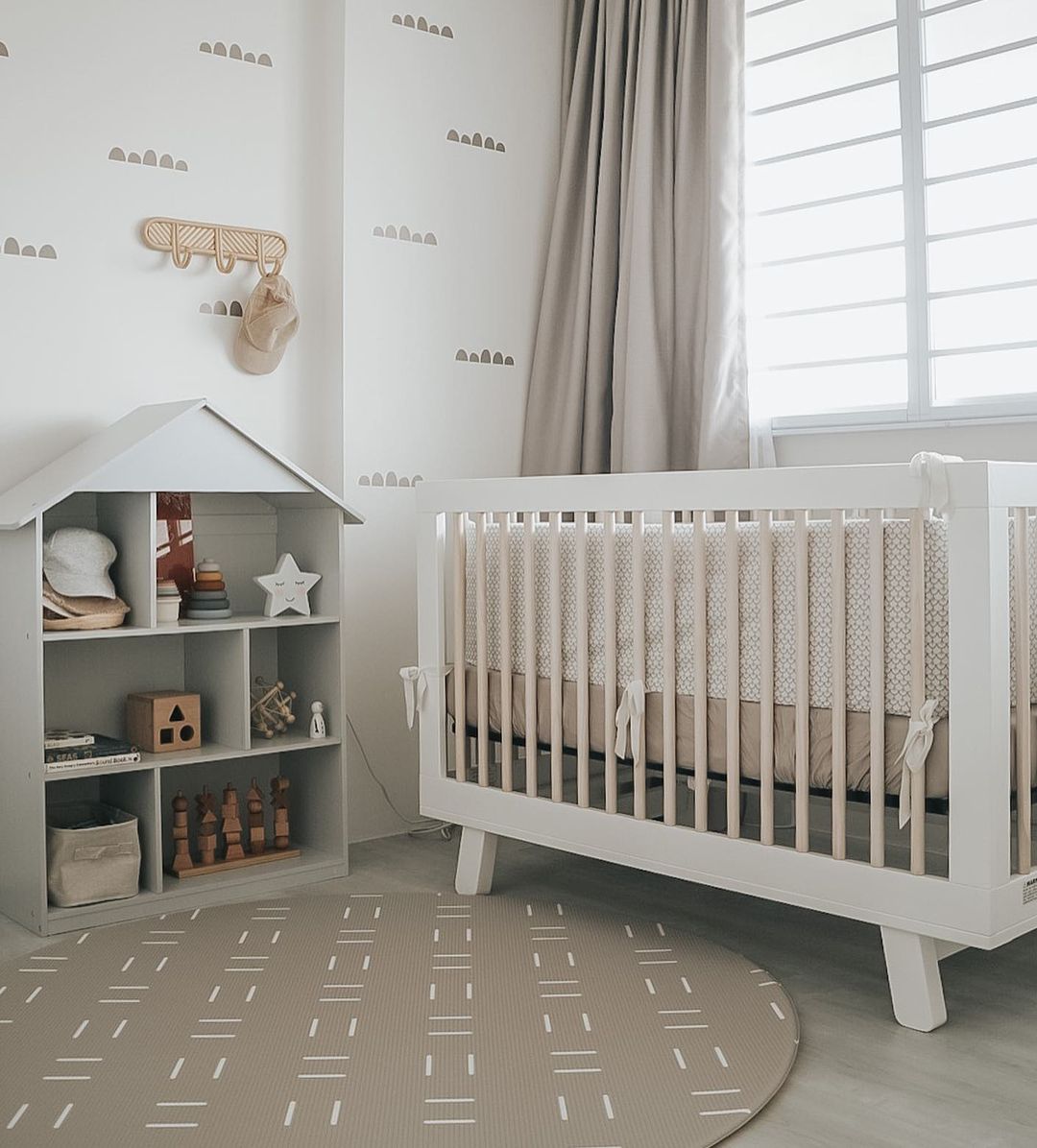 nursery inspo with crib and decor