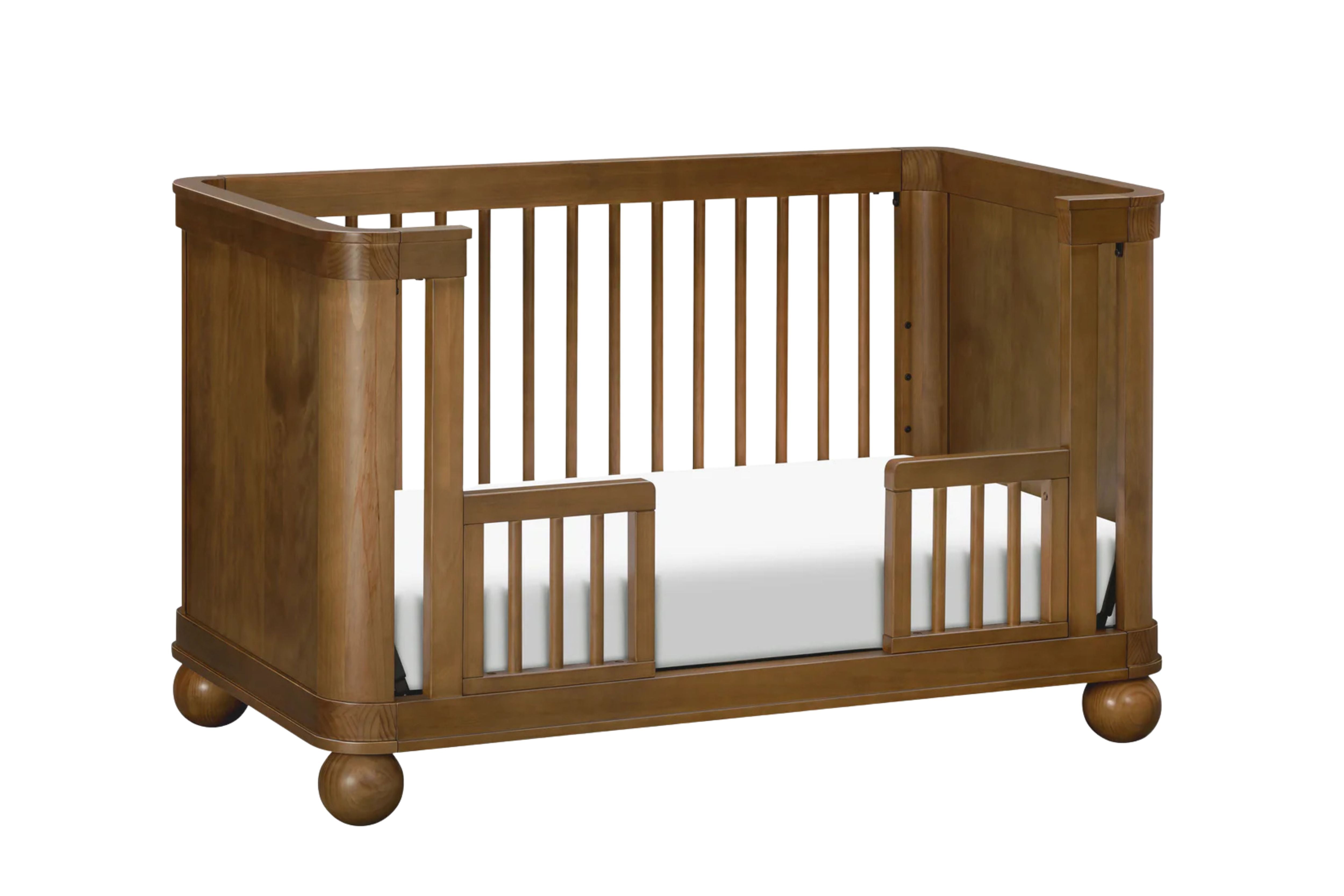Babyletto Crosby 3-in-1 Convertible Crib in toddler bed configuration #color_walnut