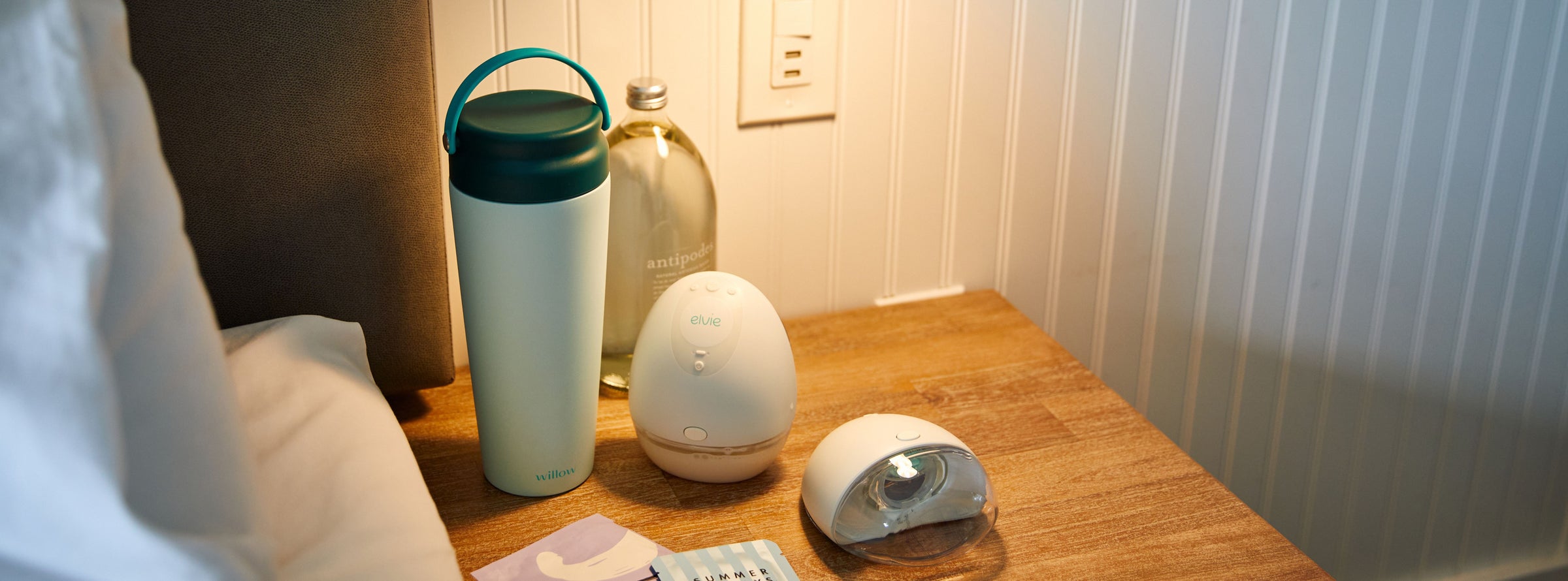 wearable breast pump at bedside in bedroom
