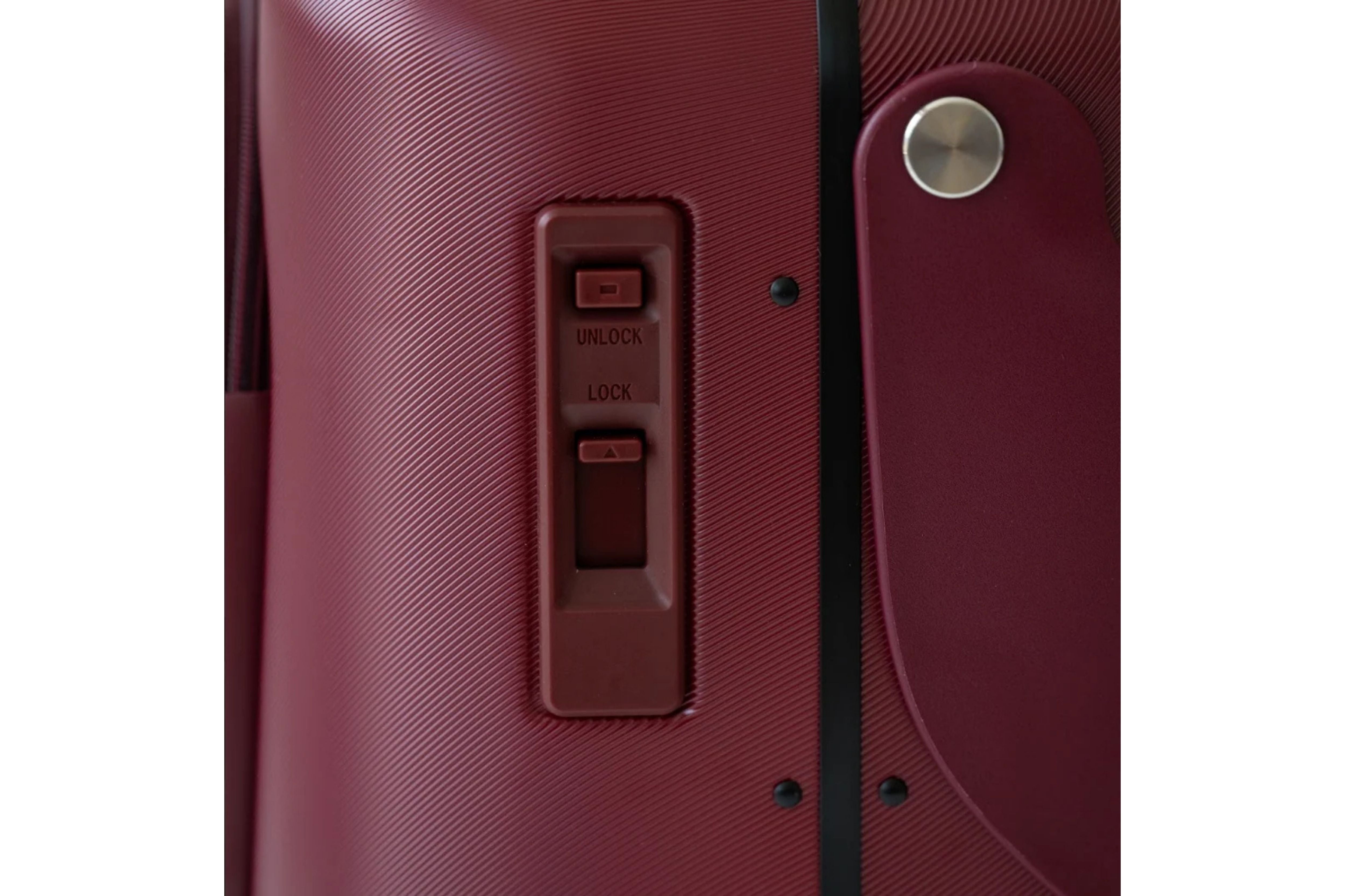 Close up of the wheel brake system of the MiaMily Carry On Plus 18” Luggage 