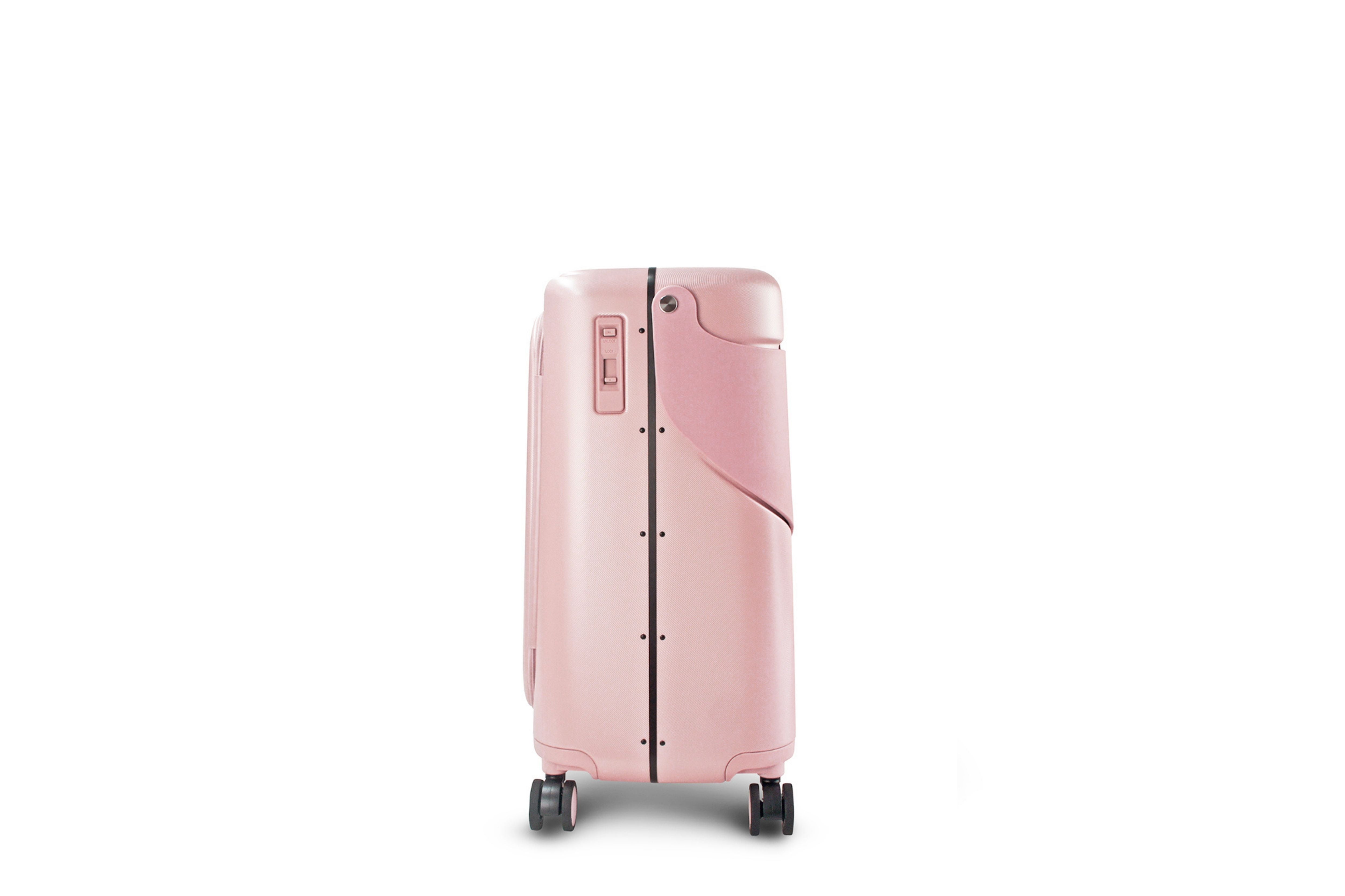 Side view of the MiaMily Carry On Plus 18” Luggage in Dusty Pink, with its built in ride-on seat down