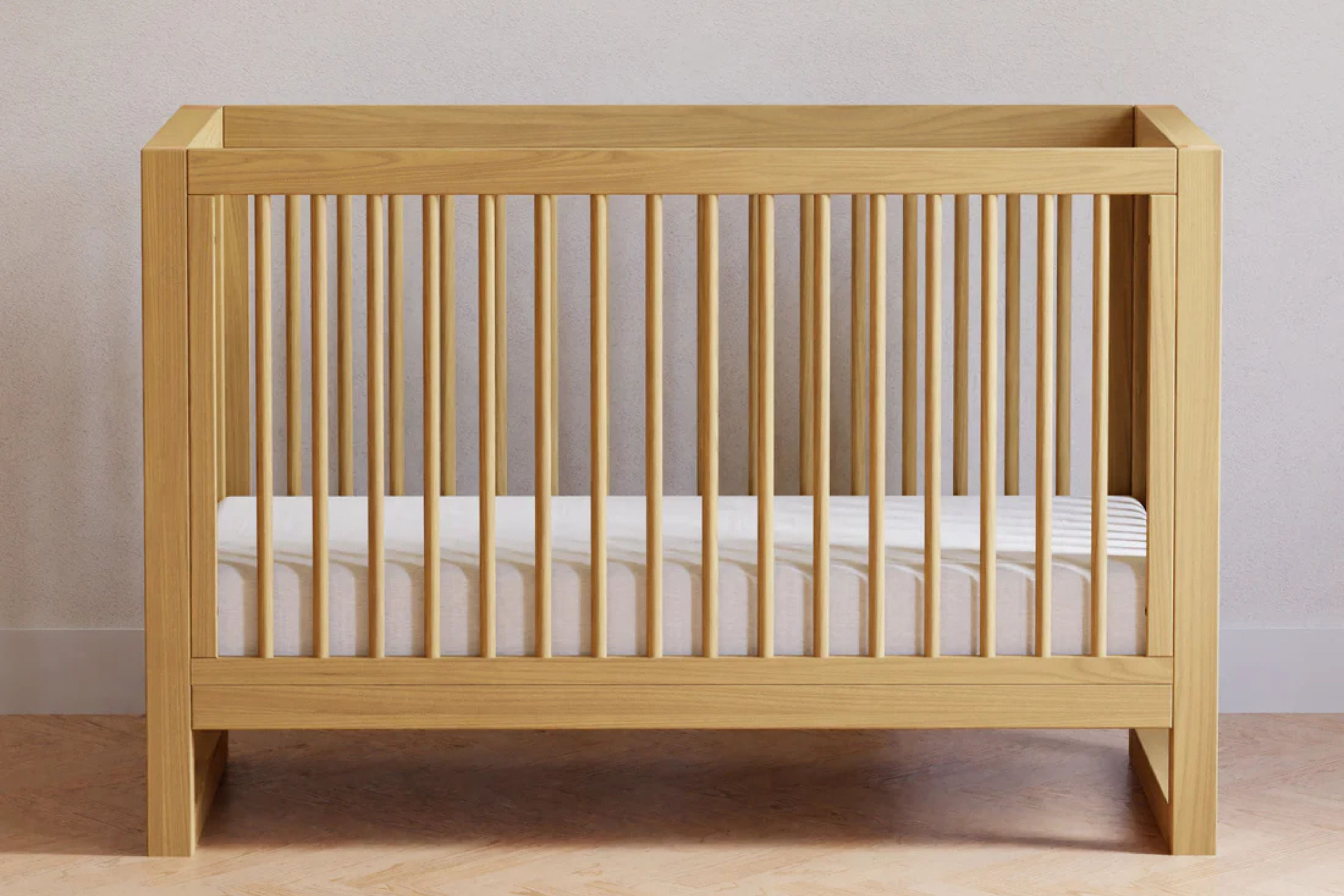 Namesake Nantucket 3-in-1 Convertible Crib in Honey finish styled as a toddler bed using the included toddler bed conversion kit #color_honey