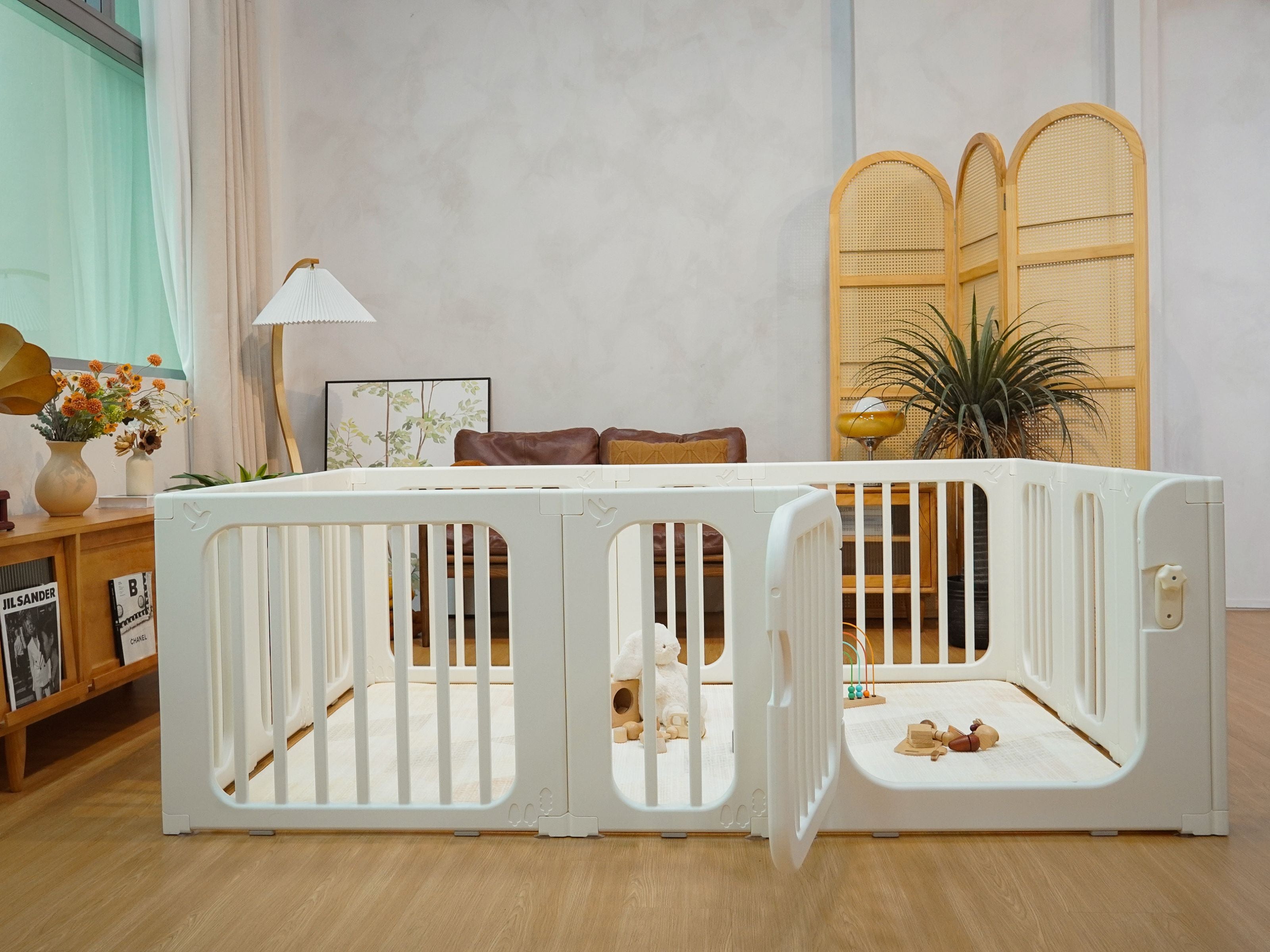 Lollibly Meadow Playpen displayed in the middle of a cosy living room setting