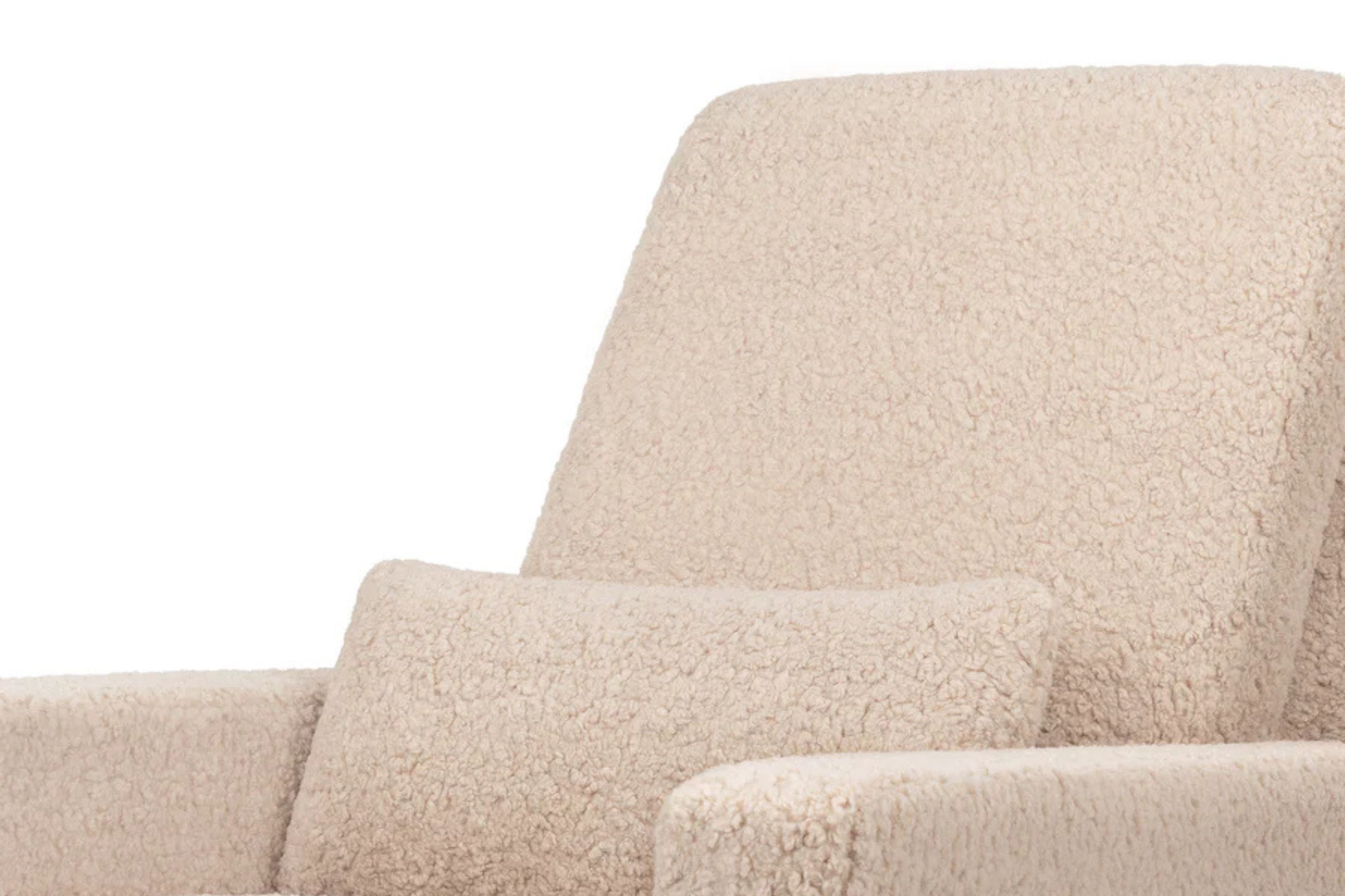 Sigi recliner and swivel glider in chai shearling #color_chai-shearling