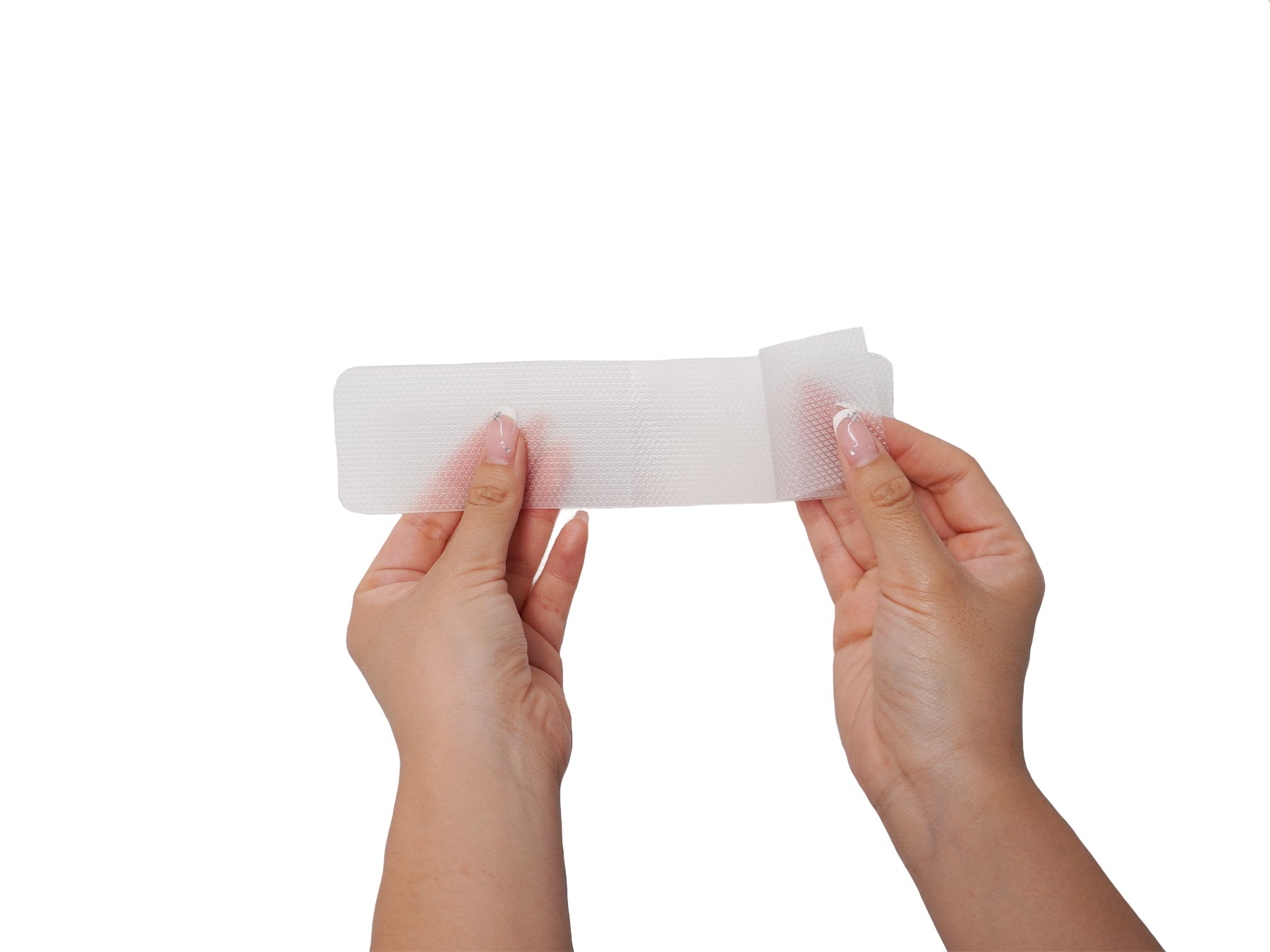 hands holding c section silicone scar patch