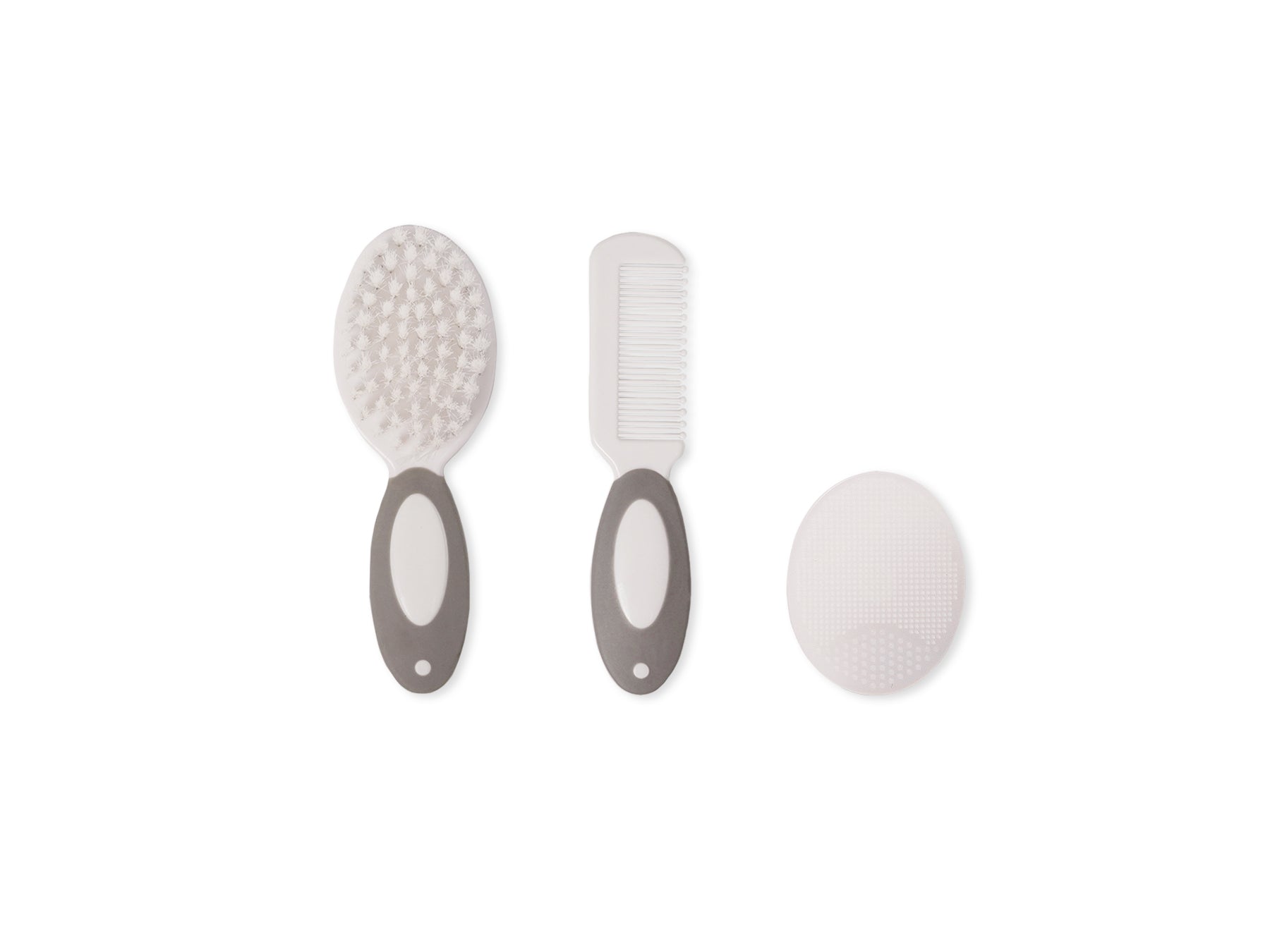 Set of three baby hair grooming tools on a white background