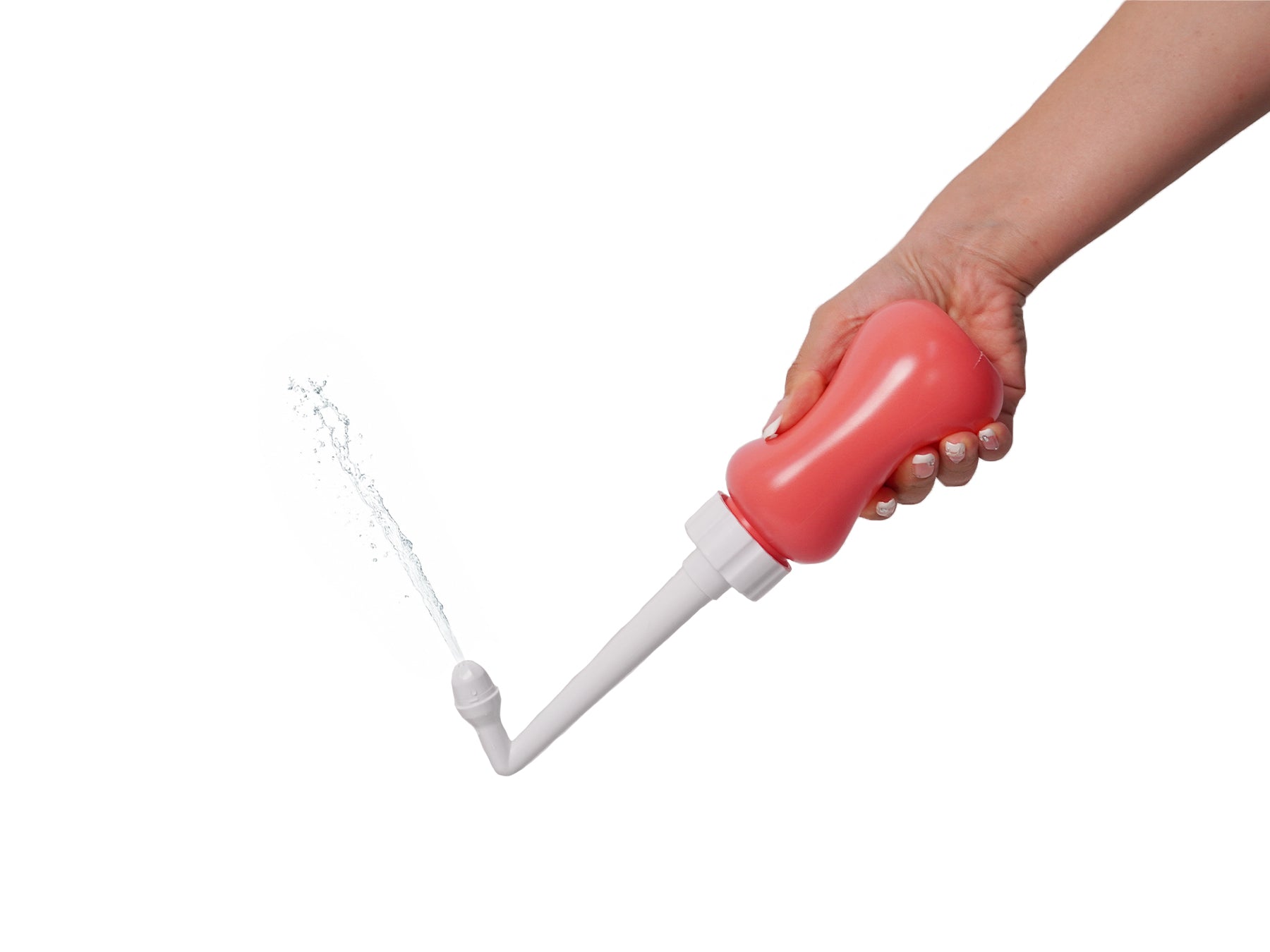 Hand holding a pink peri bottle spraying water bidet