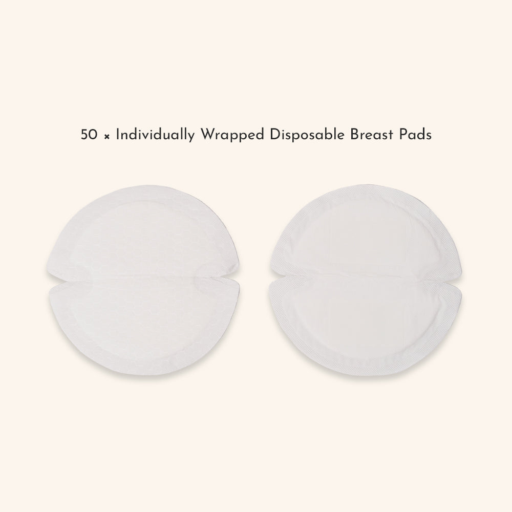 Flat lay of two individually wrapped disposable breast pads