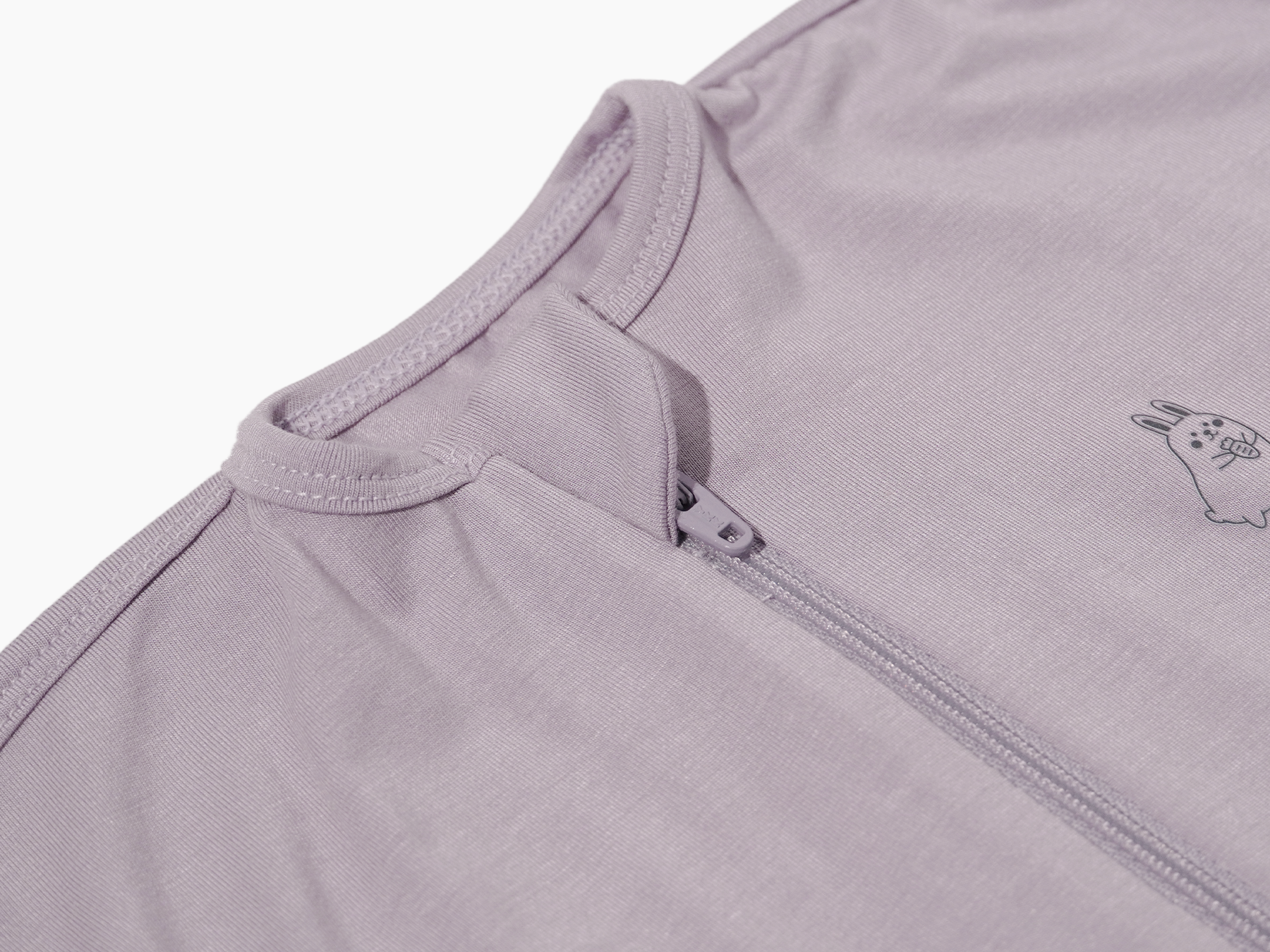 Close-up of Lollibly lavender swaddle bag hidden zipper