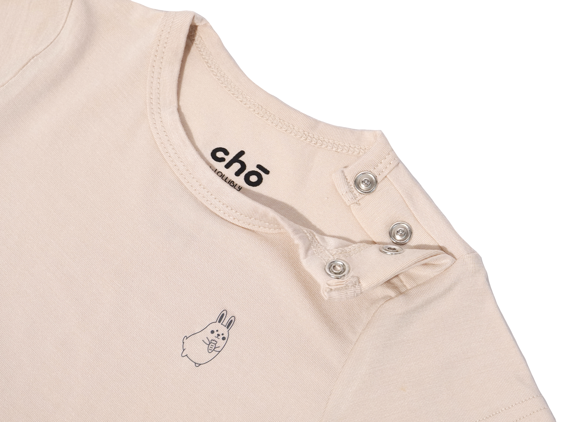 Beige sand baby onesie close up detail