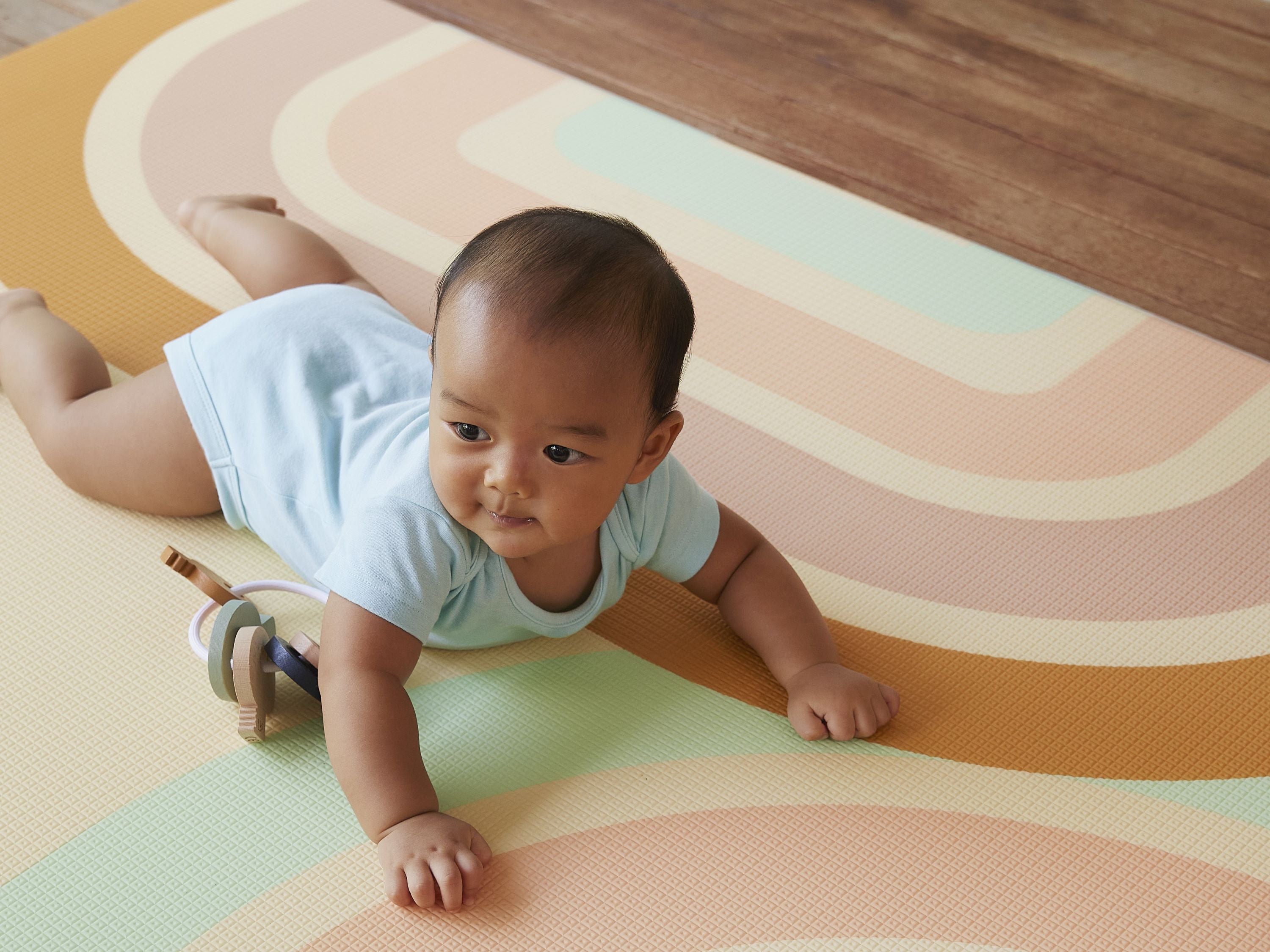 baby boy on lollibly holiday play mat
