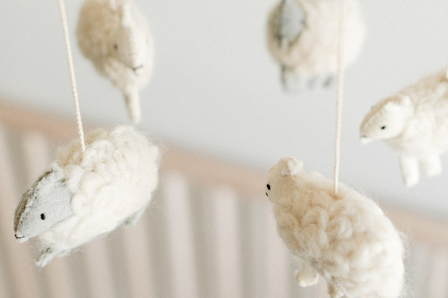 close up of pehr counting sheep crib mobile