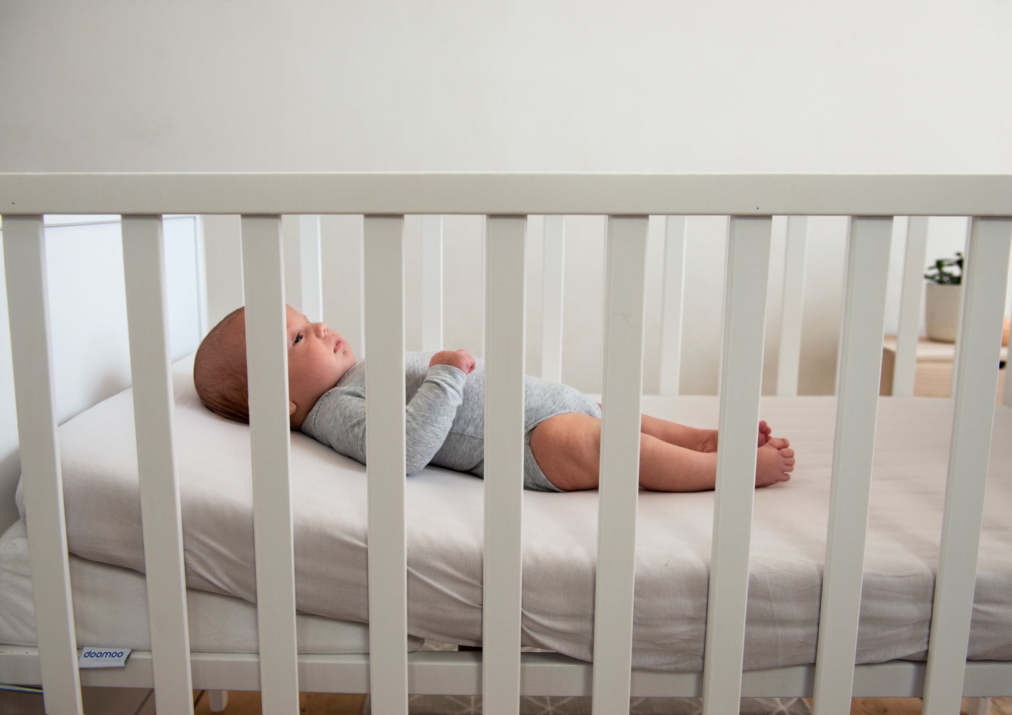 using doomoo rest easy large to elevate crib mattress