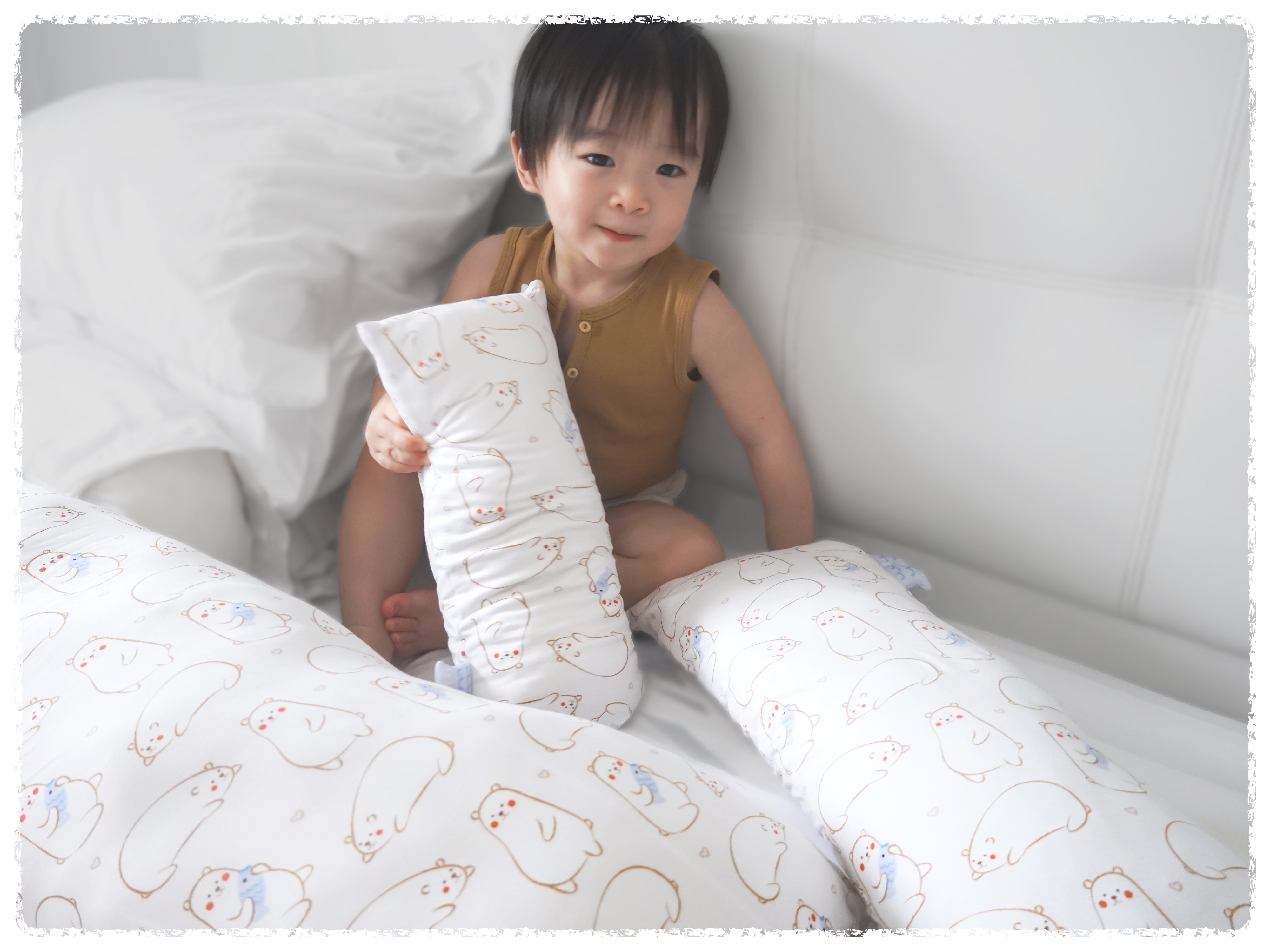 baby boy with cho maru bear pillows