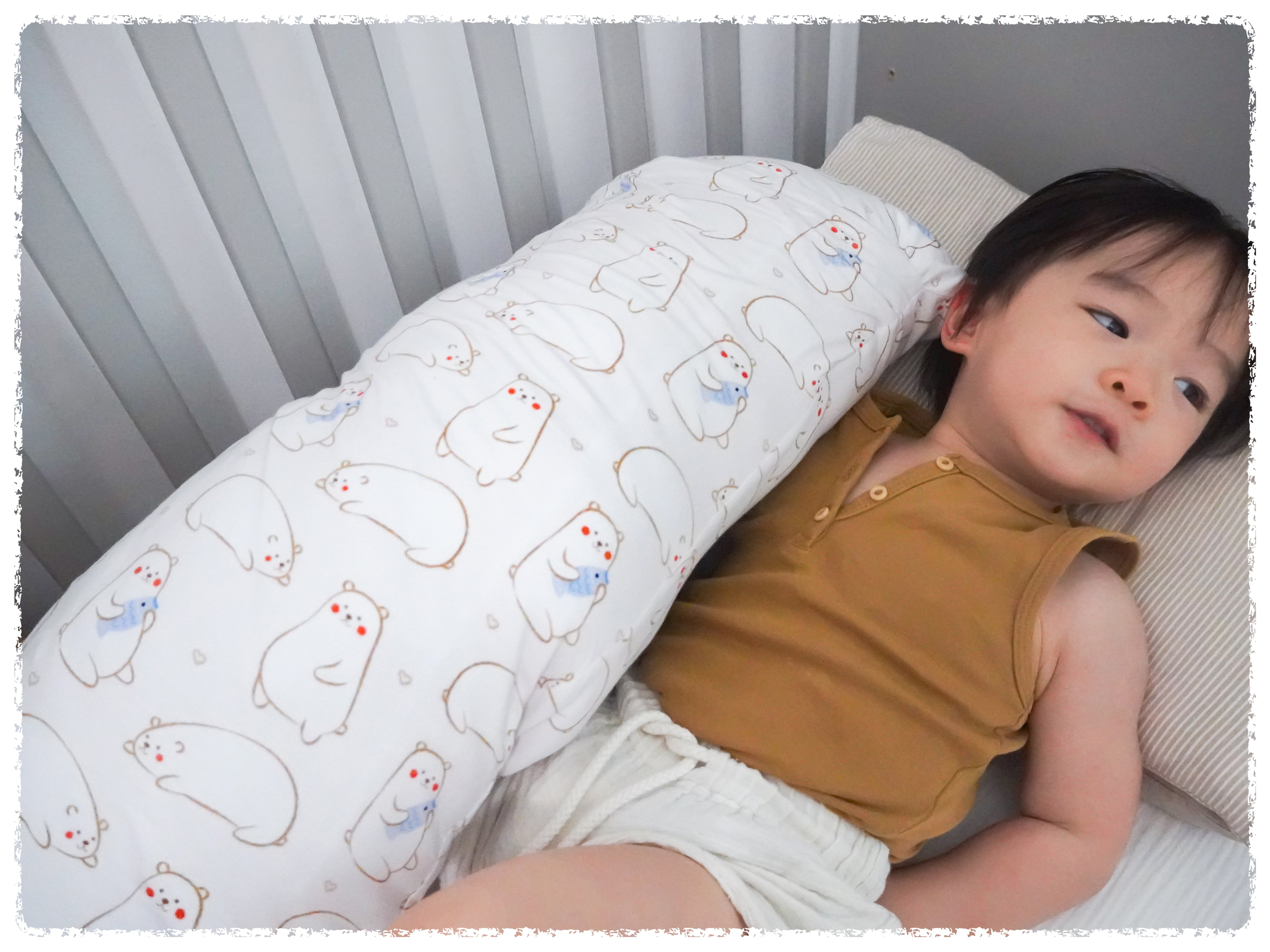 baby boy lying comfortably with cho xl maru bear soft pillows